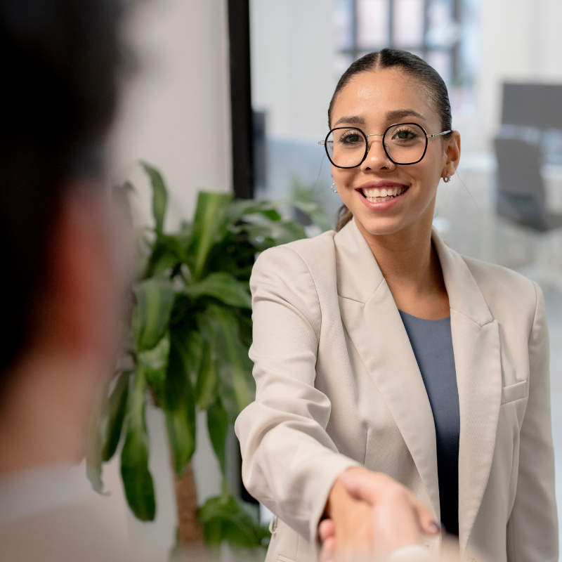 friendly staff shaking hands