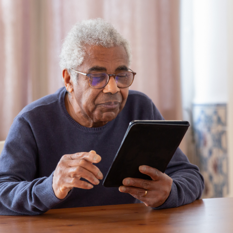 senior on ipad virtual telehealth